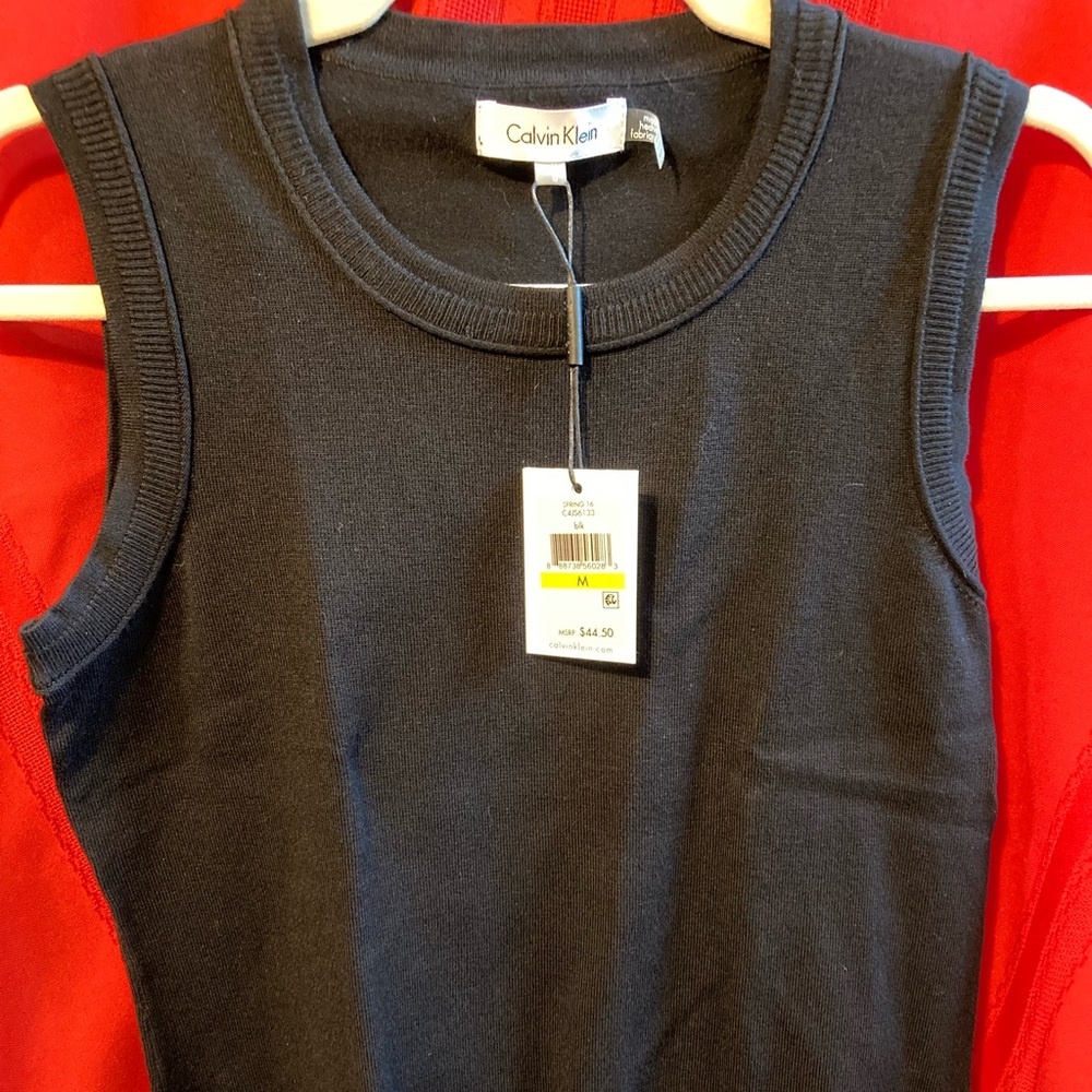 New with tags! Calvin Klein Blk Shell sweater-$44.50 new/$20 now! Soft! Medium